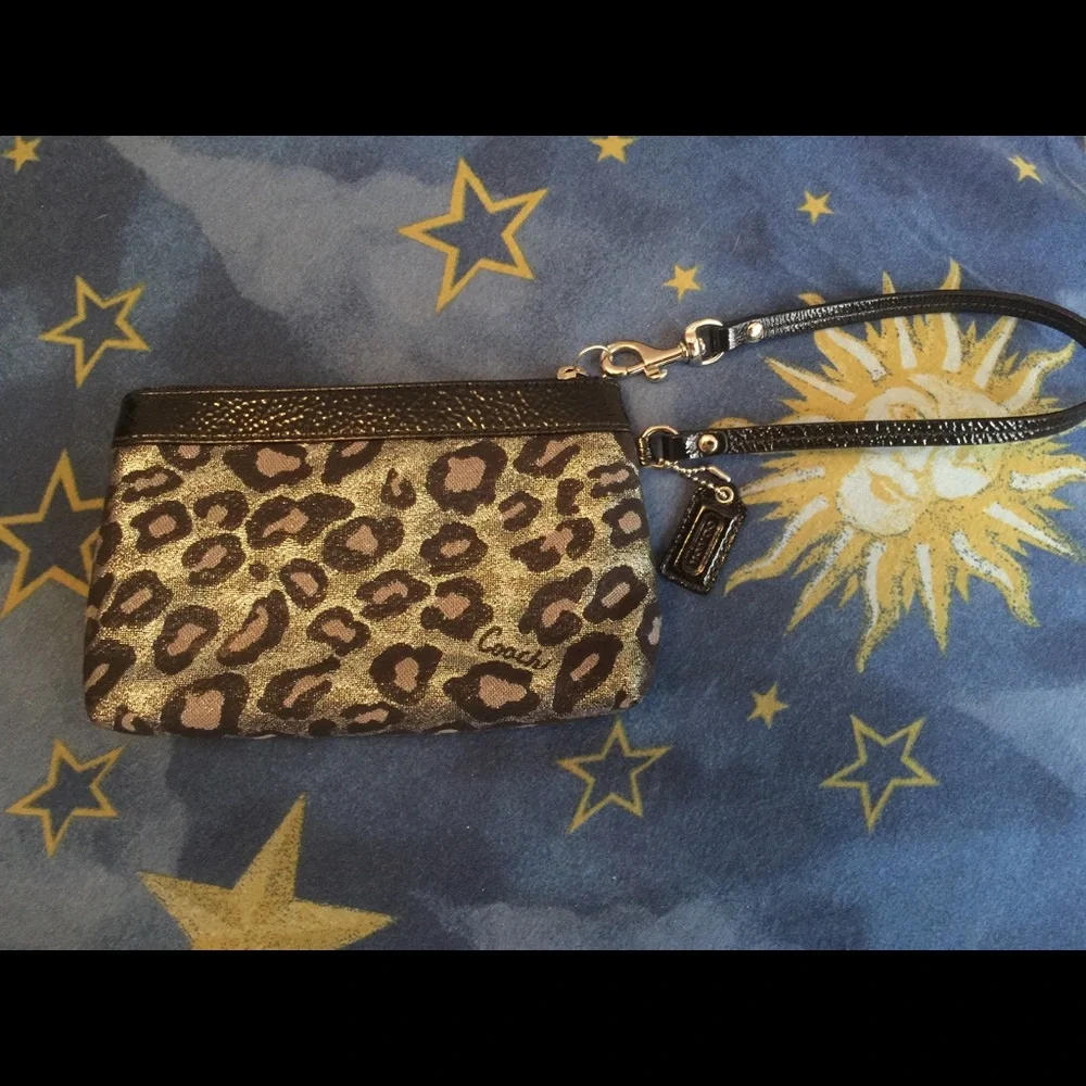 Coach ocelot print wristlet